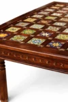Wooden dining table with colorful ceramic tile top and six chairs - Image 5